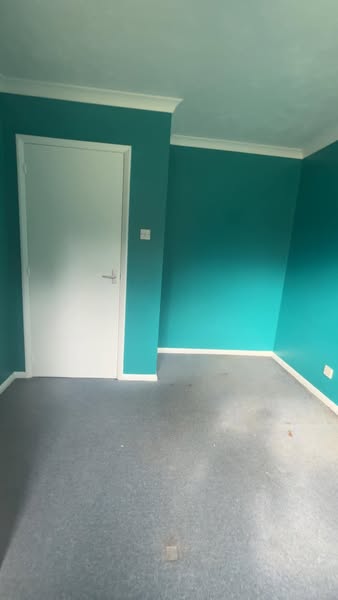 Bedroom painted in teal by female painter Maidstone