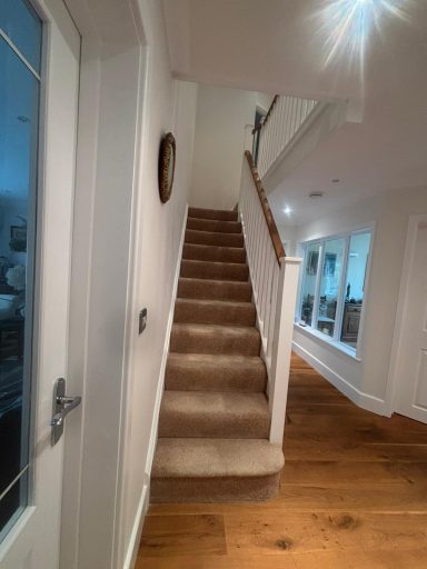 Freshly painted hallway by a female painter and decorator in Maidstone
